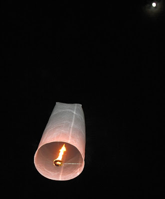 Kom Fai Lantern heading towards the full moon