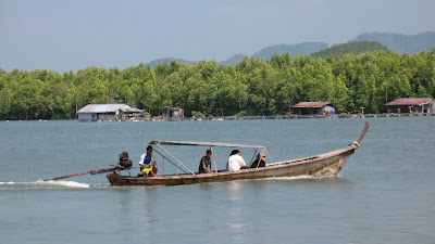 Longtail boat on the water, Phang Nga