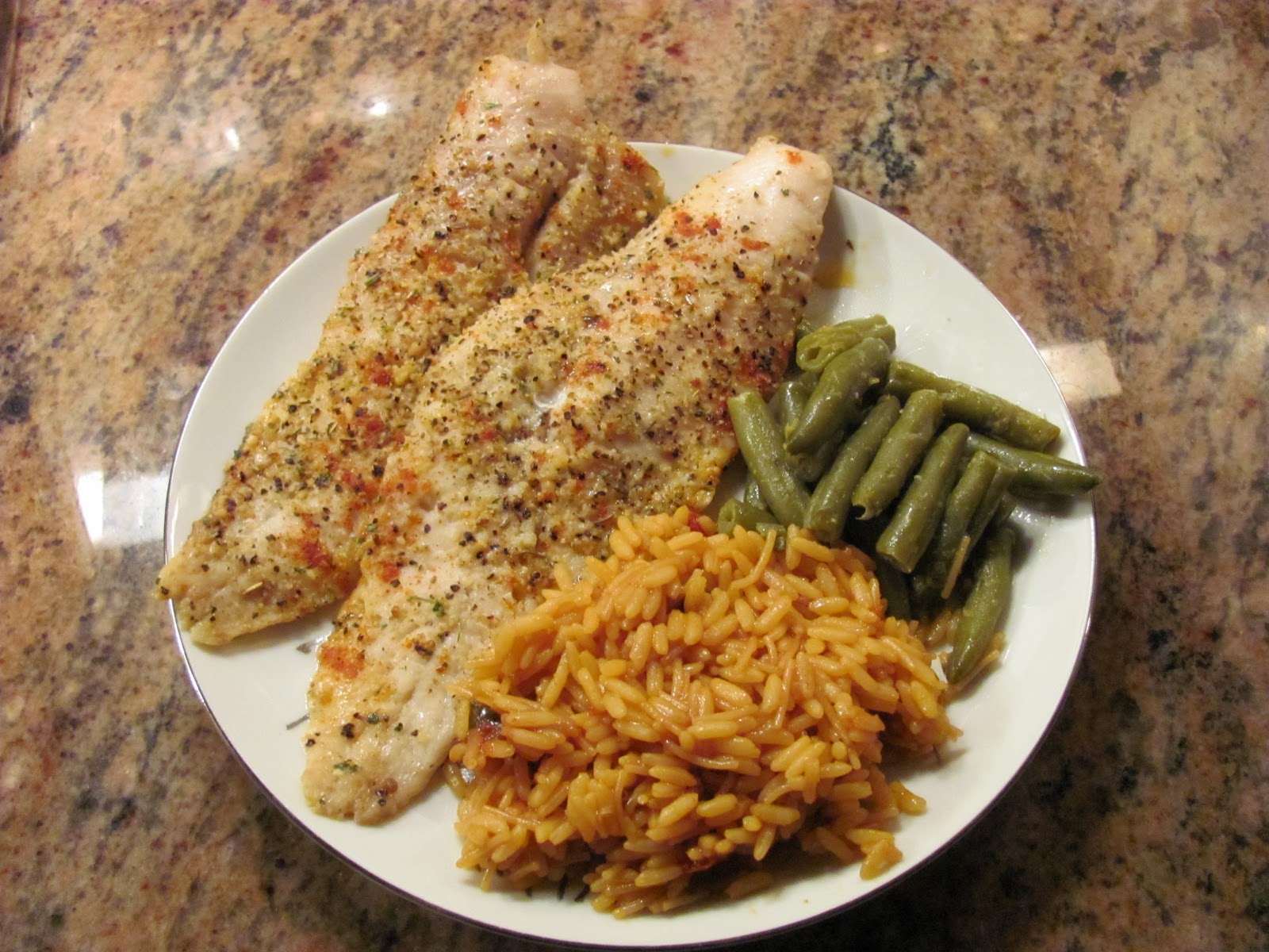 One Cheeky Chica Seasoned whiting fish, yellow rice and green beans