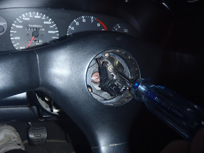 Screwdriver remove Screws Steering Wheel
