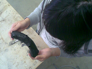 Yuri working on a sculpture.