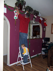 Helping Daddy w/ Christmas decorations