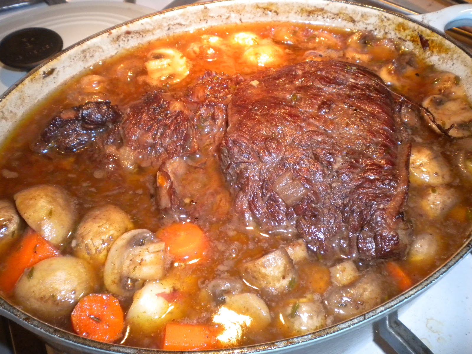 What is a recipe using chuck roast cooked in the oven?