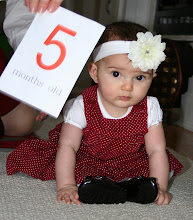Starting to sit up on her own