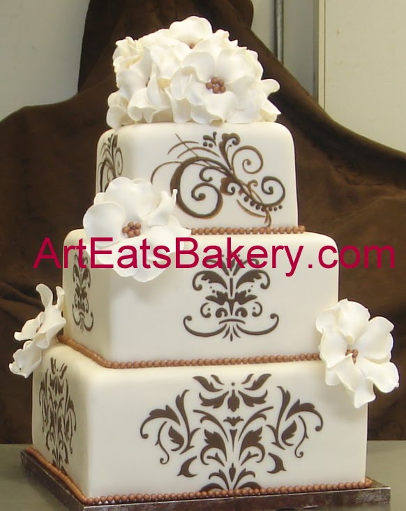 Three tier square ivory fondant wedding cake with chocolate brown and bronze