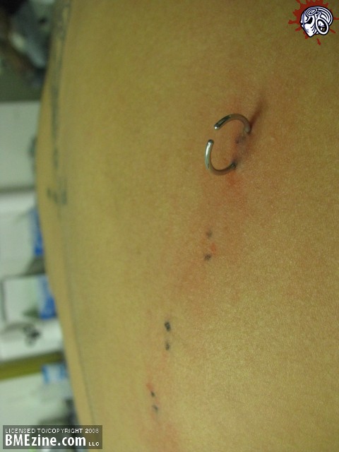 [ggyx-corset-piercing.jpg]