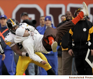 steelers_james_harrison_slams_browns_fan.jpg