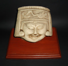 Carita sonriente simbolo de la sociedad mexicana de caricaturistas