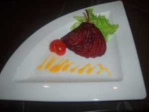 RED WINE PEAR WITH SPICED MANGO COULIS