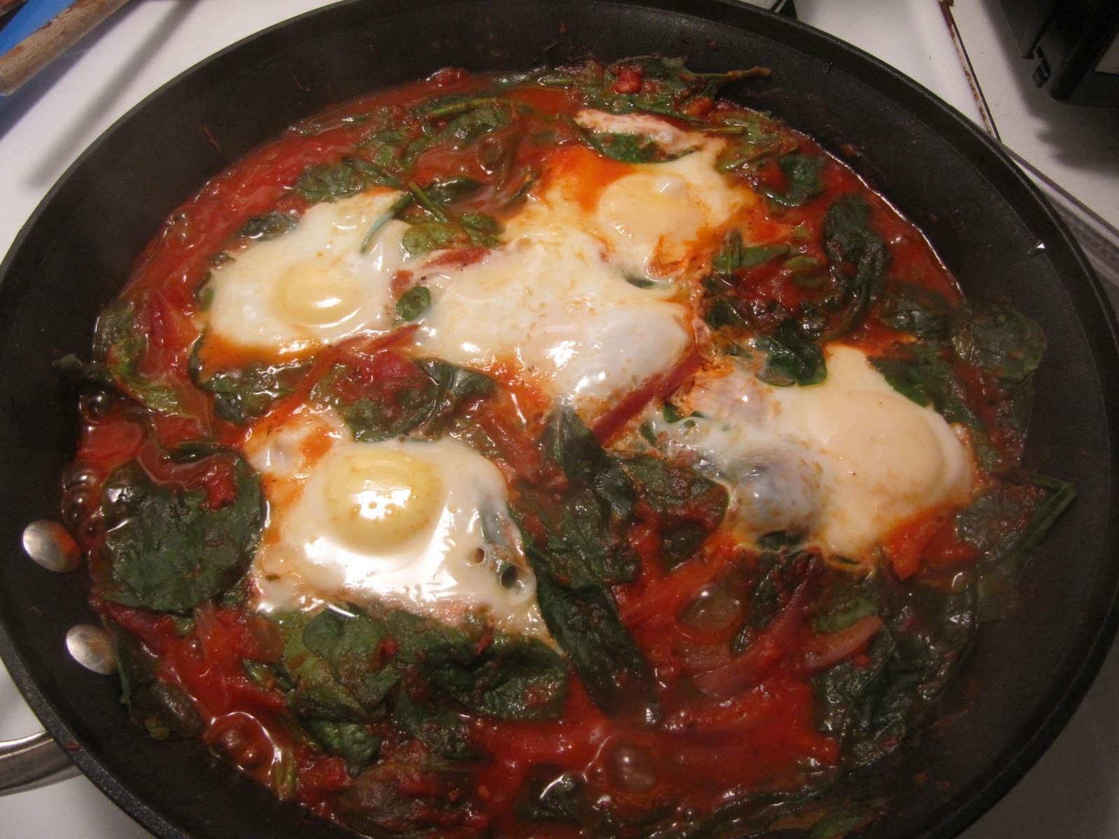 Grad Gastronomy Italian Eggs over Spinach and Polenta