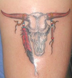 Bull Skull Tattoo With Feathers