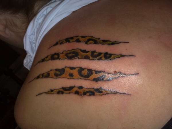 leopard spots tattoo