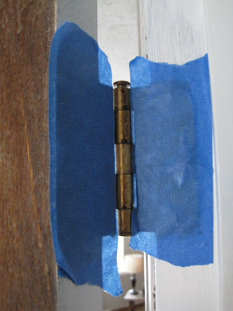painters tape on door hinge