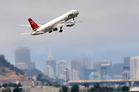 a plane flying in the sky