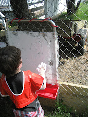 Mason "painting" with shaving cream