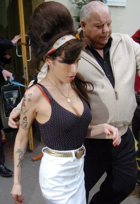 Amy Winehouse emerges from rehab