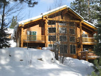 Image of front view of home in snow for winter selling season in Tahoe blog post
