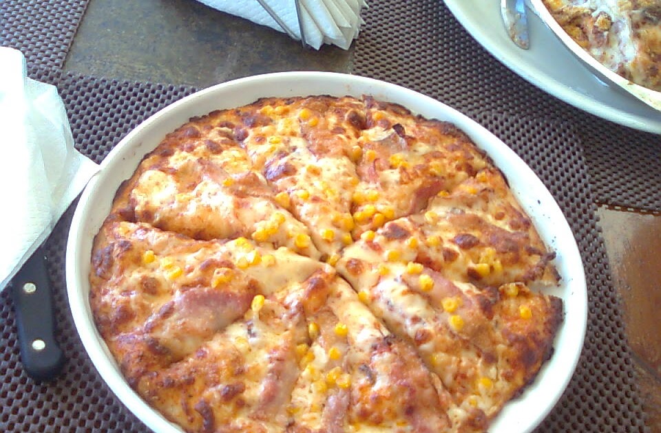 FOTOS CON Y SIN ROLLO Pizza del Restaurant Bela Piazza de Plaza Mayor