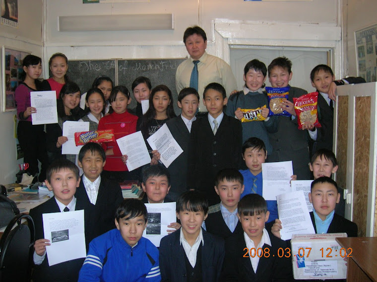 My junior students showig their american penpals` letters and gifts