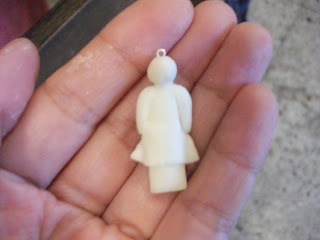 And attached the skirt with water on both sides of the doll