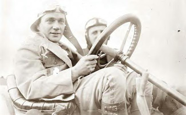 L. Strang in his race car, 10-21-1908