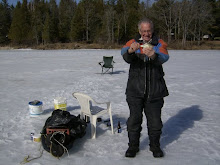 jerry  holding a big crappie from sand bay in quebec