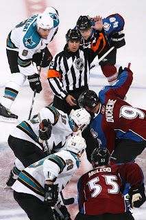 Matt Duchene faces off against Patrick Marleau on opening night