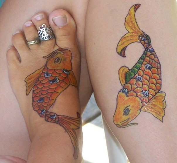 Popular Koi Fish Tattoos The beautiful bright oranges mixed with water 