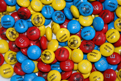Cooper kisses M&Ms
