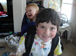 Ethan trying out the backpack