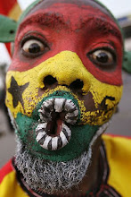 The National Flag of Ghana- on his face