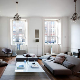 Living room with low-level sofas and tables are key to keeping the room feeling comfortable