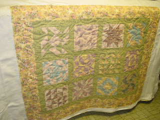 Sleepy Field of Flowers quilt with a soothing watercolor palate