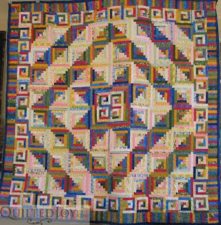 Debbie's Log Cabin quilt - phenomenal colors and patterns!
