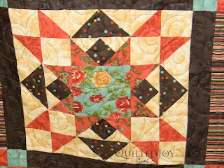 Sophisticated Quilt with Funky Fleur de Lis pantograph, quilted by Angela Huffman