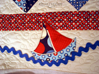 Baby Sailor quilt with custom quilting by Angela Huffman - QuiltedJoy.com