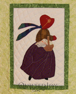 January block in a Hankie Lady Obsession Quilt with custom quilting by Angela Huffman - QuiltedJoy.com