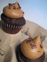 coffee buttercream cocoa nibs on mini chocolate cupcakes