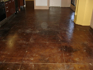 Acid stained/clear coated concrete floor.