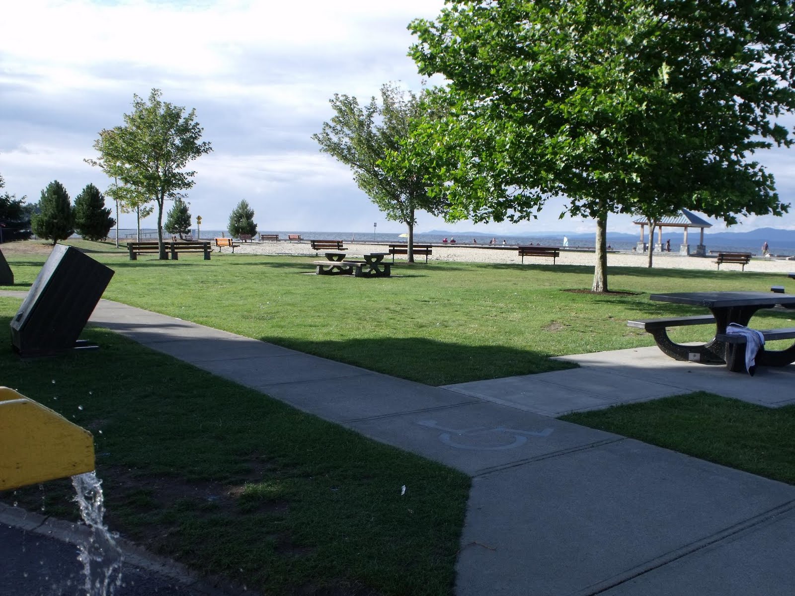 swings and roundabouts Victoria Community Park Playground Parksville