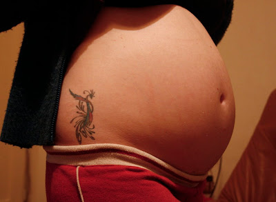 Phoenix Tattoo of a Pregnant Woman