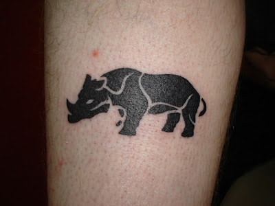 Black Rhino Tattoo in the foot
