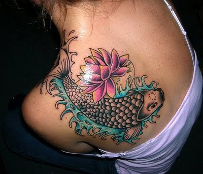 girls tattoos with lotus flower tattoos and KOI FISH TATTOOS on shoulder 