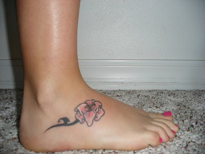 tattoos for girls on foot. rose tattoos for girls. foot