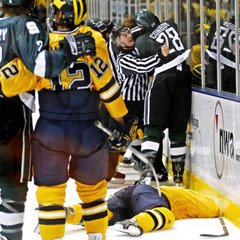 [medium_090126-andrew-conboy-restrained-after-kampfer-hit.jpg]