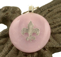 pink art glass with fleur de lis pendant