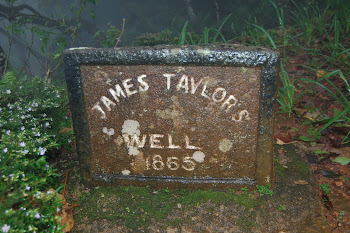 james tailors wel near his ruined bangalaw