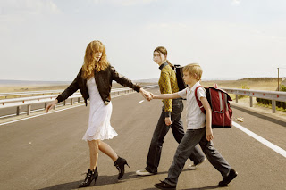 Still from the film Home - crossing the road to go to school