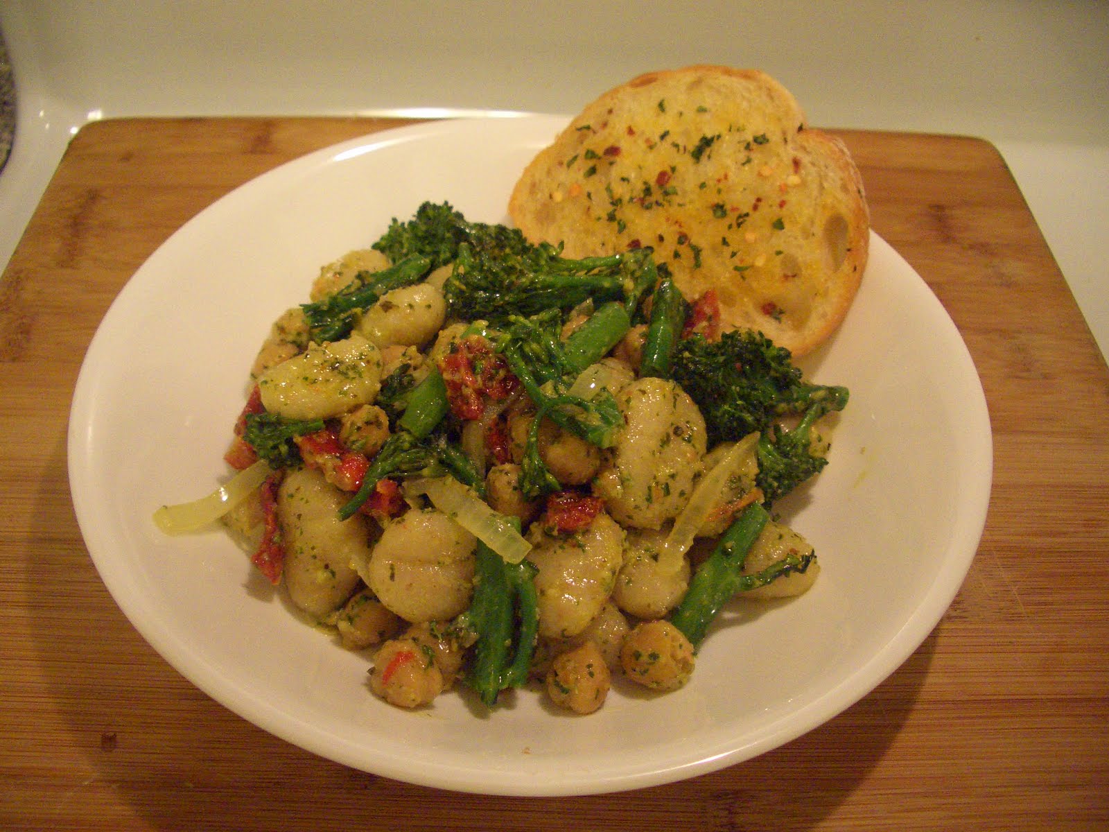 Invariably Vegan Pesto Gnocchi with Sundried Tomatoes and Broccolini