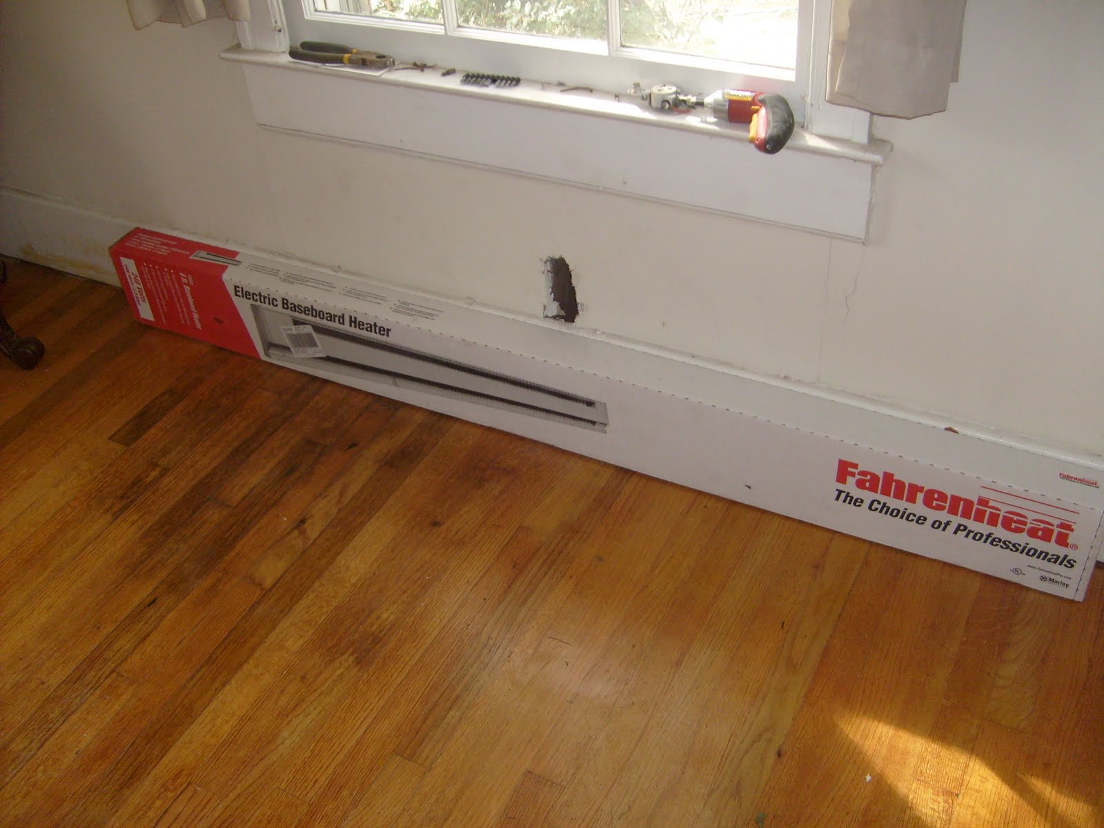 How do you wire an electric baseboard heater?